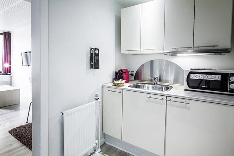 Manon Les Suites Guldsmeden Copenhague Exterior foto A typical studio apartment kitchen